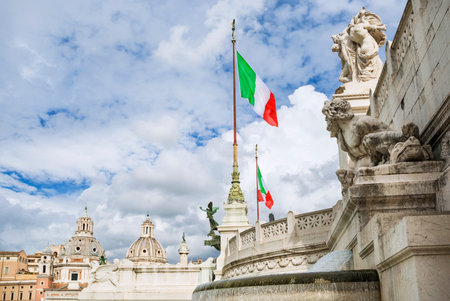 Beautiful clouds above monuments in the historic center of Romeの写真素材