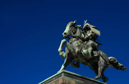 Kusunoki Masashige samurai bronze equestrian statue erected in 1897 in the center of Tokyo (with copy space)の写真素材