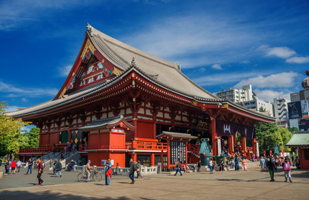 Tokyo, Japan, October 18, 2017: Tourists visit old Senso-ji Buddhist Temple during the Golden Dragon Dance Festival in Asakusaのeditorial素材