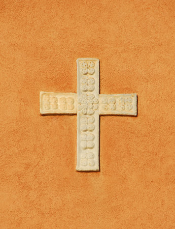 Holy Cross religious symbol relief on a Venice wallの写真素材