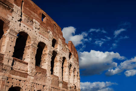 Coliseum inner ring monumental arcades with blue sky and clouds in Romeの写真素材
