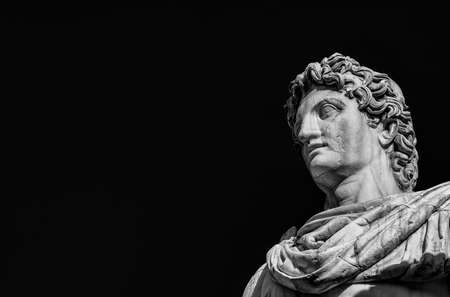 Ancient marble statue of mythical character Castor or Pollux, dated back to the 1st century BC, located at the top of monumental balustrade in Capitoline Hill, in Rome (Black and White with copy space)の写真素材