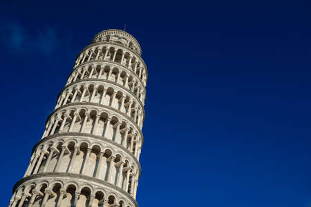 Leaning Tower of Pisa seen from below against a blue sky (with copy sapce)の写真素材