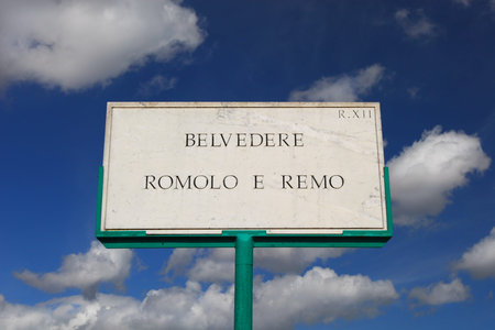 Romolus and Remus panoramic terrace old marble street sign among clouds in Rome