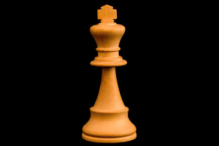 White King standard chess wooden piece on black backgroundの写真素材