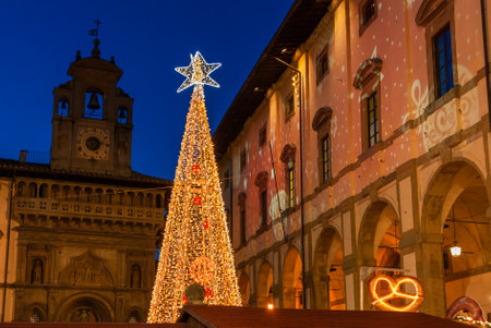 Arezzo, Italy, November 22nd, 2018: Christmas in Arezzo, Tuscany. Christmas tree and market in the 'Piazza Grande', city main squareのeditorial素材