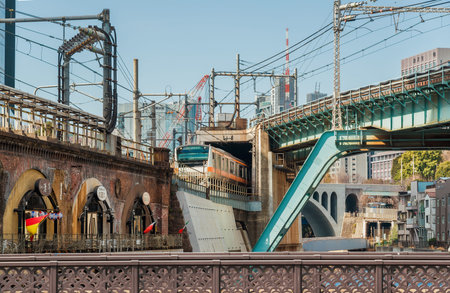 Tokyo, Japan, February 17, 2019: Train junction near Ochanomizu Railway Station and Kanda River in...