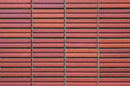 Red and orange brick wall texture as background