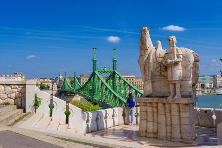 Budapest, Hungary, September 16, 2016: View of Liberty Bridge, River Danube and Budapest city center from Gellert Hill terrace with St Stephen King of Hungary monumentのeditorial素材