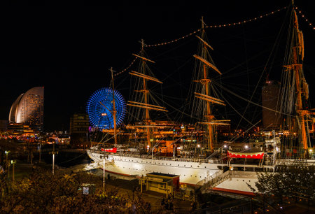 Night view of Yokohama Port with Cosmo World Amusement Park and Nippon Maru shipのeditorial素材