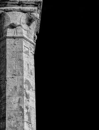 Medieval architecture in Perugia. Ancient marble column (Black and White with copy space)の写真素材