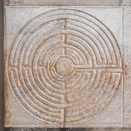 Mysterious ancient labyrinth relief at the entrance of Lucca Cathedral in Tuscany (12th century)のeditorial素材