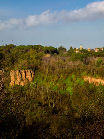 View of Tor Marancia urban park in Rome with the old Church of Saint Sebastian domes and belfryの写真素材