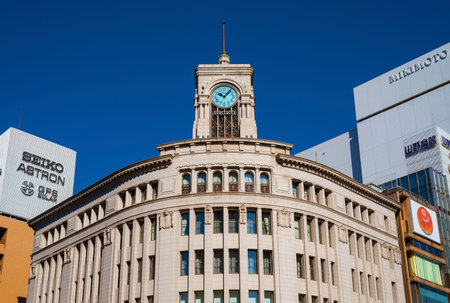 View of art deco Wako Building with its iconic Clocktower symbol of the Ginza fashion and boutique district in the very center of Tokyoのeditorial素材