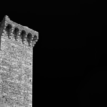 Medieval walls in Italy. Assisi ancient medieval walls ruins (Black and white with copy space)