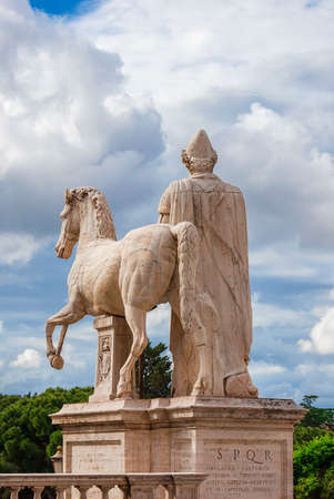 Capitoline Hill ancient roman statues of the Dioscuri in the center of Rome (1st century BC), among cloudsの写真素材