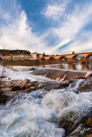Winter view of Monte San Quirico and River Serchio rapids near the city of Luccaの写真素材