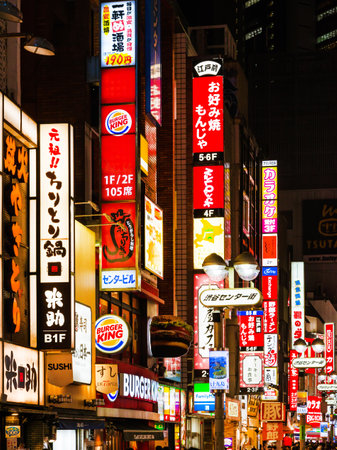 TOKYO, JAPAN - MARCH 25, 2019: Tokyo neon lights, billboards and colorful signs in Shibuya Center Streetのeditorial素材