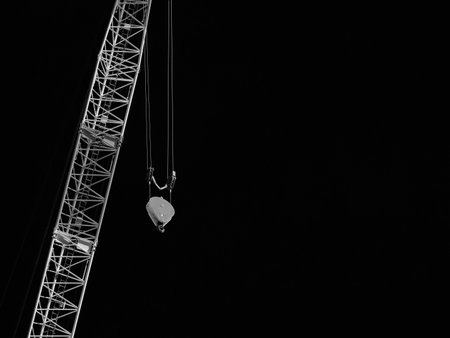 Hook suspended from a construction crane (Black and White with copy space)の写真素材