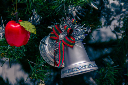 Christmas bells in a decoration treeの写真素材