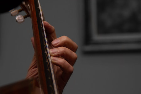 Man playing an acoustic guitar