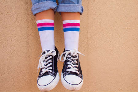 Woman with bisexual flag on her socksの写真素材