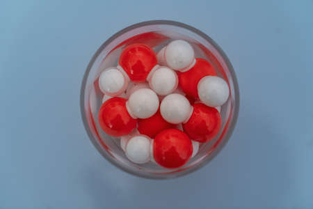 Isolated glass of water with water moleculesの写真素材