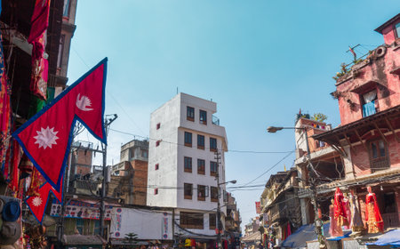 Kathmandu City center with buildings and Nepal flag on the left at November 14th 2019のeditorial素材