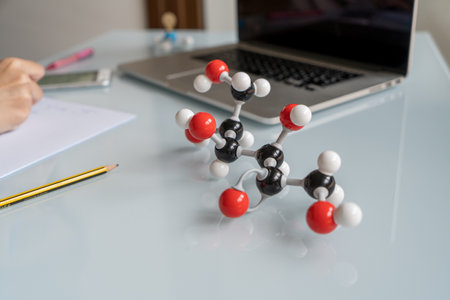 Close-up molecular model of fructose structure during chemistry class.の写真素材