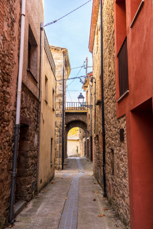 Vertical picture of ancient street in AlbanyÃ  town, a medieval village at Catalan Pyrenees in Girona, Spainの写真素材