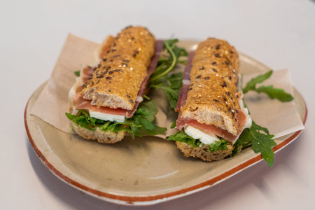 sandwiches with ham, arugula