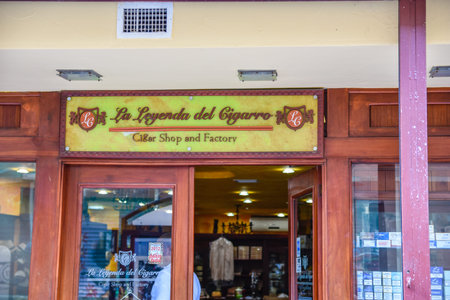 Santo Domingo, Dominican Republic. Street view of Calle el Conde, La Leyenda del Cigarro, Colonial Zone.のeditorial素材