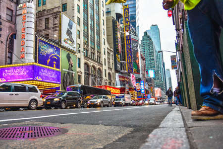 New York, USA Manhattan. Times Square crowds and traffic in the evening with Broadway Theaters and animated LED signs.のeditorial素材