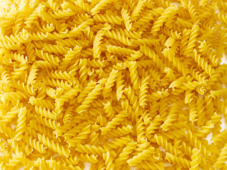 Pile of pasta spread out on a surface