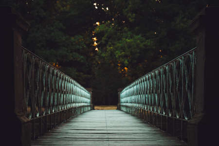 decorative bridge over the river at sunset timeの写真素材