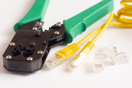 Modular plug crimpers for RJ-45, white background, Crimper, Twisting Cable Tool for Crimping RJ 45 LAN cableの写真素材