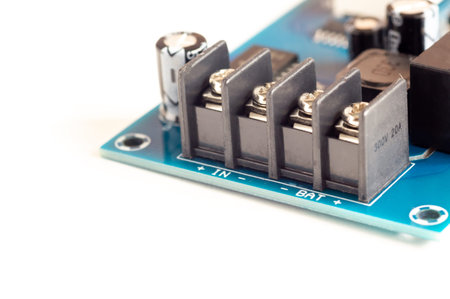 Electronic components, chips and capacitors on the blue pcb, close up view. Technology concept