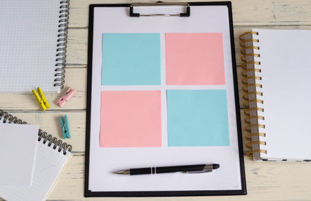 Blank sheet, colored post-it notes, pen