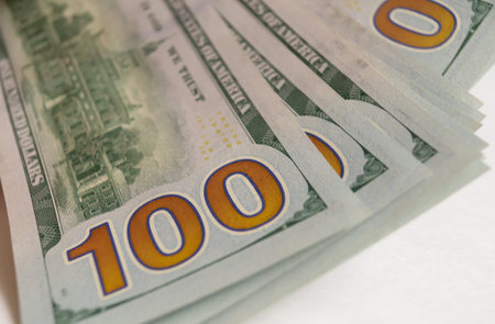Close-up of $100 bills.
