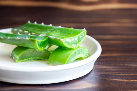 Aloe vera plant close-up on wooden backgroundの写真素材