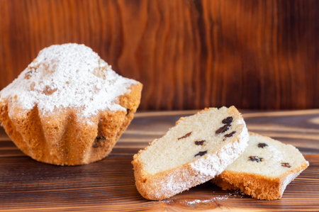 Cake with powdered sugar and raisins