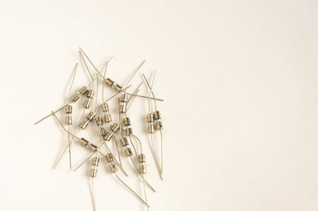 Fuse electric fuse miniature on white background.