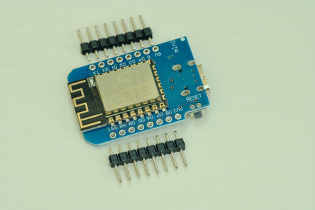 ESP8266 NodeMCU microcontroller isolated on a white background