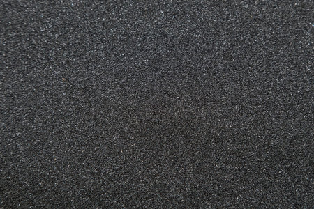 Close up of of skateboard grip tape. Macro photograph of sandpaper textureの写真素材