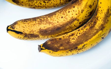 Top view of brown spotted bananas. Banana with dark black spotsの写真素材