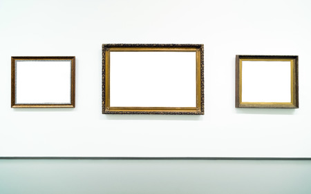 Blank empty golden frame on white background. Art gallery, museum exhibition white clipping pathの写真素材