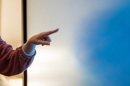 Close up of woman hand pointing at flip board chart at the office, business, people and education conceptの写真素材