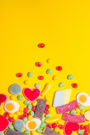 Pile of delicious colorful chewing candies background. Colourful sweetsの写真素材