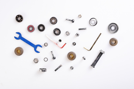 different tools, bolts, bearings on white backgroundの写真素材