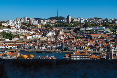 Above the roofs of red tiles overlooking city of Porto, Portugalのeditorial素材